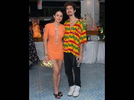 Gideon Issa poses with Isa Porto while celebrating his birthday at Couples Tower Isle’s Reggae Kulcha Explosion event.