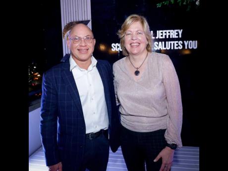 Jeffrey Hall (left), outgoing chair of Scotia Group Jamaica, with his successor, Anya Schnoor.