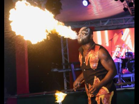 Sheldon ‘Brainstar’ Donaldson heating up the audience during his fire-breathing performance at the Kulcha Explosion event for Couples Tower Isle 45th anniversary.