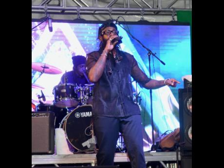 Tarrus Riley performs at at the Kulcha Explosion event for Couples Tower Isle 45th anniversary last Saturday.