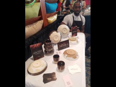 Michael Hudson with an array of ceramic items from HUNE at the Christmas in July event last year.