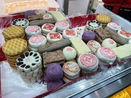 Two new year gift boxes of traditional pastries at a bakery in Beijing, China.