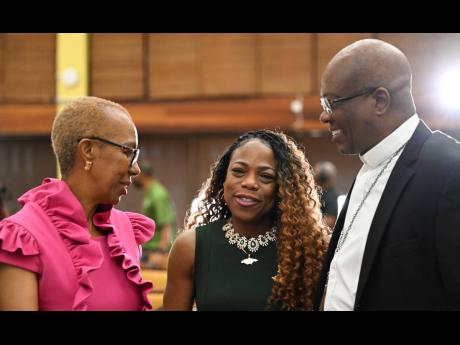 From left: Minister of Education Fayval Williams, Keishia Thorpe and Archbishop Kenneth Richards at Global Education Teacher Summit.