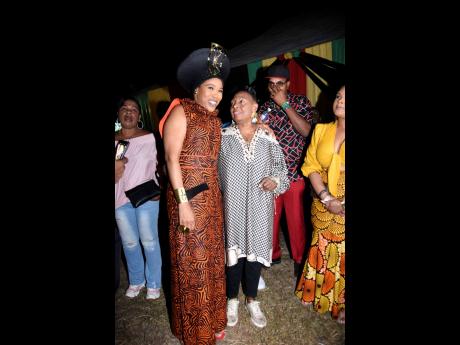 Based on the smile on Queen Ifrica’s face (left), it’s possible that Minister of Culture, Gender, Entertainment and Sport, Olivia ‘Babsy’ Grange was doling out praise for her great preformance. 