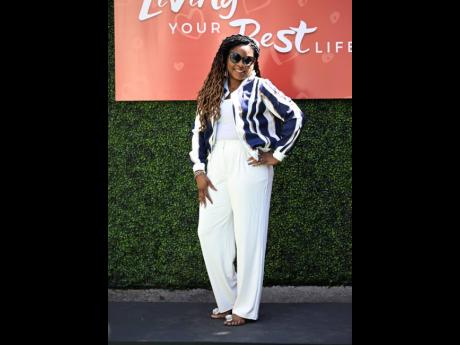 Yanique Quest, managing director of Coastal Capital in Montego Bay, added some stripes to her white ensemble.