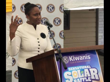 Children’s Advocate Diahann Gordon-Harrison addressing the launch of the Kiwanis Club of North St Andrew’s Sensational Solar Raffle at the Mustard Seed Communities’ Matthew 25:40 Home in downtown Kingston on Thursday.