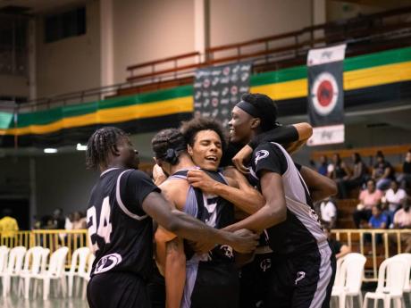 
From left: Elite Storm players Trayvon Jefferson Bey, Brandon Armstrong, Deven Okowuga and Daunte Millis celebrate an Elite 1 Caribbean Basketball League semi-final win over Elite Waves at the National Arena on Friday.