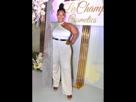 Le Champ Cosmetics owner, and Flair 23 Women to Watch in 2023 recipient, Shanique Ellington, knew she needed to sparkle in her role as a sponsor for Yard Mas Carnival launch and she certainly shined with her choice of a silver and white jumpsuit. 