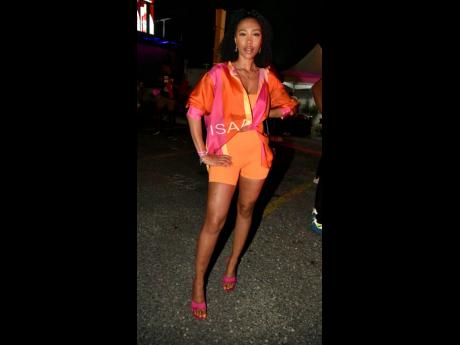 Vanessa Henry was tropical meets sporty in pink and orange.