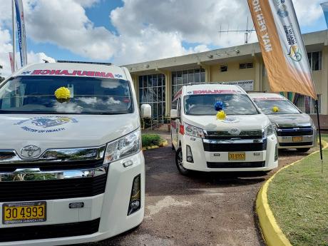 Seen here are three of four ambulances handed over to the Southern Regional Health Authority earlier this month.