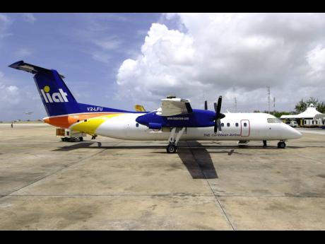  A LIAT aircraft waits on the tarmac. LIAT, an inter-island carrier, was owned by governments of the eastern Caribbean.