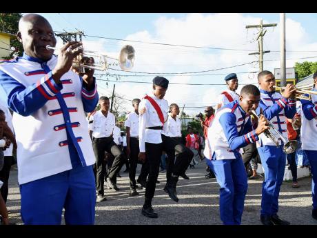 The George Washington marching band performs in the Guy’s Hill community in St Catherine on Sunday, January 29 at the 10,000 Men and Families Movement rally.