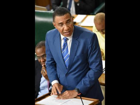 Prime Minister Andrew Holness delivers a statement on Haiti’s security situation during Tuesday’s sitting of the House of Representatives.