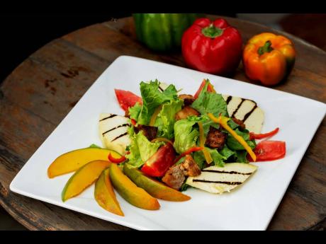 In a symphony of flavour, Chef Esson presents a jerk mango roasted breadfruit salad.