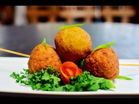 Feast your eyes on this scrumptious sweet potato and salt fish croquette. 