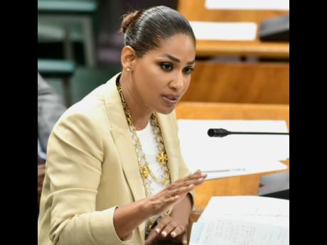 St Ann South East Member of Parliament Lisa Hanna makes a point during a sitting of the House of Representatives on Thursday.