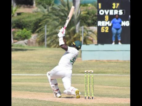 Jamaica Scorpions opener Leroy Lugg hits one of his four sixes at the Coolidge Cricket Ground against the Leeward Islands Hurricanes on day two of their West Indies Championship match in Antigua yesterday.