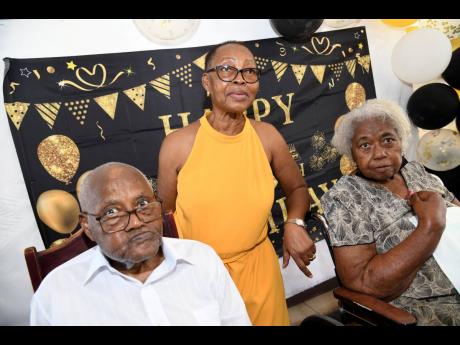 World War II Veteran Gervist Adolphus Neale  celebrates his 100th birthday with his daughter Rosemary Neale Irving (centre), and sister Edris Bennett at a celebration luncheon at Curphey Place, on January 22.