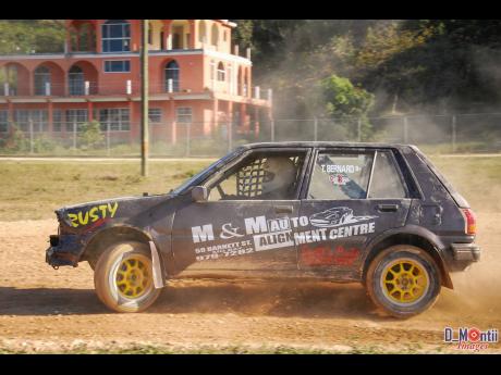 Troy Bernard and his Starlet WRC, jokingly referred to as the Worlds Rustiest Car.