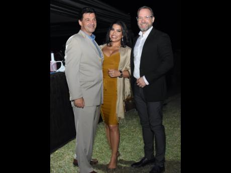 From left, Richard Burrowes, President of Rose Hall  Developments Ltd shares lens with Tanisa Samuel, and Philipp Hofer, director of operations, Iberostar Jamaica and Aruba.