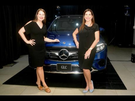 Mercedes-Benz Brand Sales Manager Amanda Issa (left) and Jacqueline Stewart-Lechler, managing director of Stewart’s Auto Sales Ltd, standing in front of the new GLC. 
