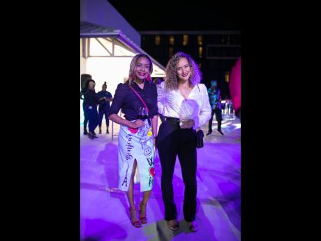 Dr Jillian Ranglin Robinson (left), director and owner of New Kingston Medical, and Donna Walker, director at Alrode Entertainment Ltd, were among the specially invited guests to view the dual reveal.