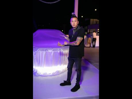 Car enthusiast Nick Lue anticipating the reveal of the new BMW 7 Series.