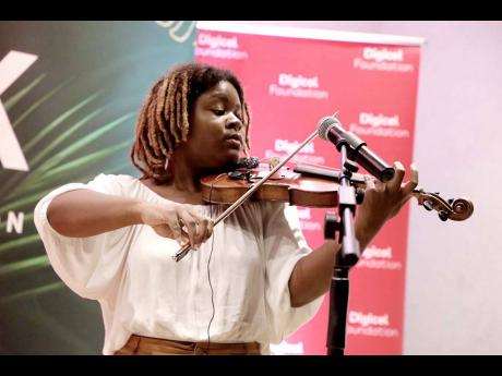 Violinist Yinga plays Bob Marley’s ‘Jamming’ at the welcome reception for the PAIRS group. 