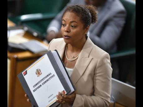 Legal and Constitutional Affairs Minister Marlene Malahoo Forte addresses lawmakers in the House of Representatives on Tuesday.