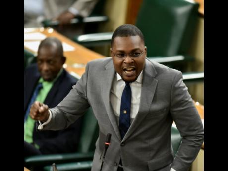 Clarendon North Central Member of Parliament Robert Nesta Morgan is animated as he makes a point in the House of Representatives on Tuesday. 