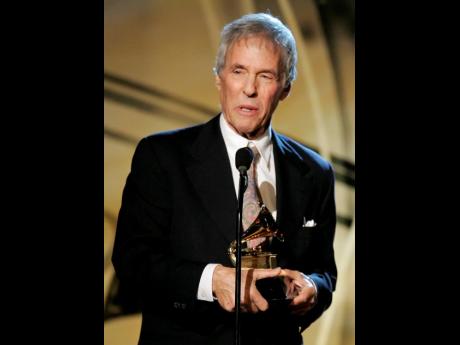 FILE - Burt Bacharach poses with the award for best pop instrumental album for 'At This Time' at the 48th Annual Grammy Awards on February 8, 2006, in Los Angeles. Bacharach died of natural causes Wednesday, February 8, 2023, at home in Los Angeles, public