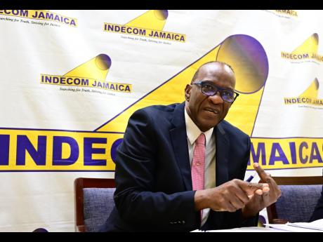 Hugh Faulkner, commissioner of INDECOM, addresses a press briefing on the watchdog’s fourth quarterly report in St Andrew on Thursday. 