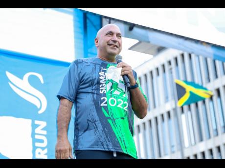 Christopher Zacca, president and CEO, Sagicor Group Jamaica addressing the participants  at the 2022 Sigma Corporate Run event. The event was significantly scaled down with less than 5000 people participating in total over a two weekends.
