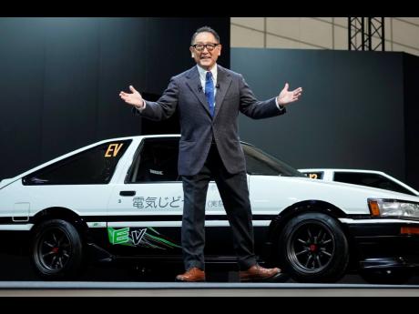 Toyota Motor Corp. Chief Executive Akio Toyoda delivers a speech on the stage at the Tokyo Auto Salon.