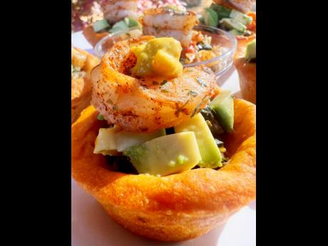 Feast your eyes on the bok choy with sautéed shrimp, topped with a passion fruit sauce and served in a sweet potato cup.