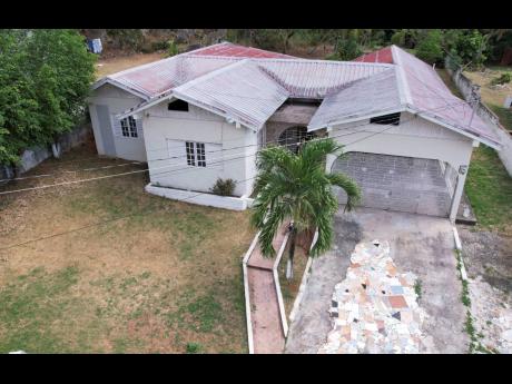 The 14 Highland Close property in Havendale, St Andrew, that is at the centre of a legal dispute between Leonie Cummings and Yvonne Sailsman.