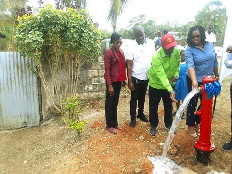 From left: Deputy Mayor of Lucea, and Councillor for the Sandy Bay division in the Hanover Municipal Corporation, Andria Dehaney-Grant; , Minister of Local Government and Rural Development, Desmond McKenzie; and member of Parliament for Western Hanover, in