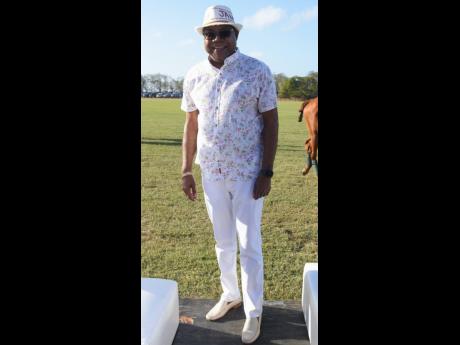 Minister of Tourism Edmund Bartlett pulled on his whites for the event. 