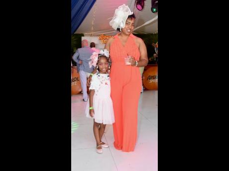 Little Layla-Marie Morris poses with her mother, the National Environment & Planning Agency’s Tamara Woodit.