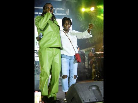 Proud mother Bermalee Hyde joins her son, Yaksta, on stage at his album launch last Tuesday.