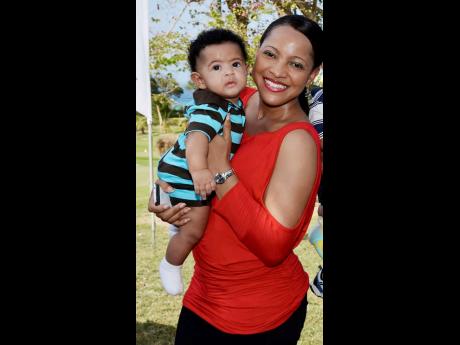 
In this 2013 Gleaner photo, Amoi Leon poses with her infant son Gabriel King. The mother is locked in a battle with the police to access information from her phone that may be helpful in Gabriel’s murder investigation.