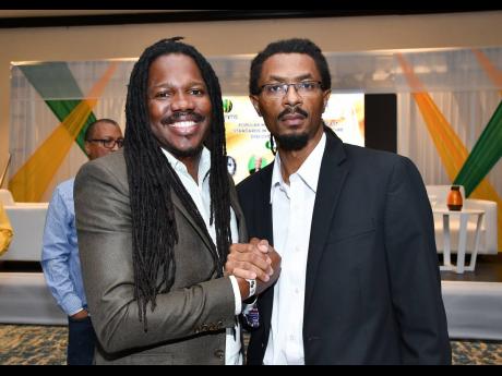 Panellist Damian Crawford (left) and JAMMS General Manager Evon Mullings.