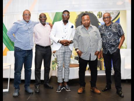 From left: Mikie Bennett, Dennis Howard, Seanizzle, Snow Cone, and Clevie Browne, who were members of the producers’ panel at JAMMS Music seminar at The Jamaica Pegasus hotel recently.