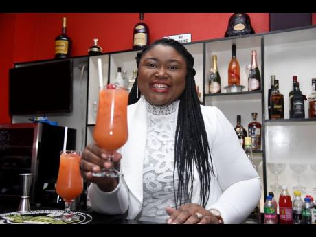 Dr Spence-Minott presents the Campari orange with a radiant smile. The CEO is happy to a bring a difference to the ‘mix’.