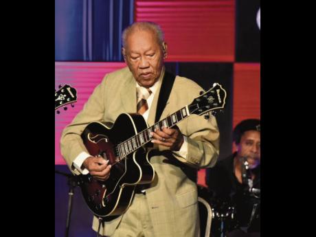Guitar maestro, Ernie Ranglin, performs at the Bring Back the Love concert held at the Courtleigh Auditorium in New Kingston on Saturday.