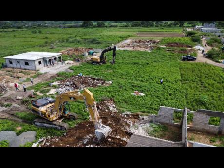 An aerial view of the site close to the community of Clifton in St Catherine, where 10 unfinished structures were demolished last October as the Government moved to end illegal construction in the area.
