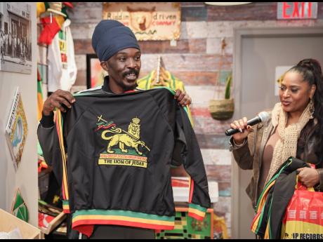 Anthony B smiles during a presentation at the pre-Black and Proud reggae concert meet-and-greet held at VP Records retail store in Queens, New York. 