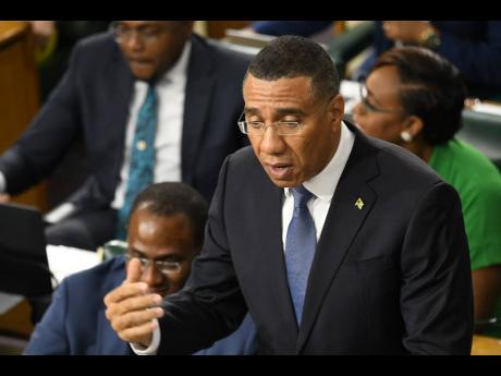 Prime Minister Andrew Holness making his contribution to the Budget Debate during a sitting of the House of Representatives at Gordon House in Kingston on Thursday.