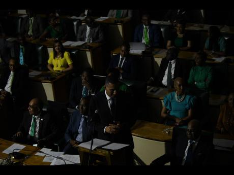 Stunned lawmakers sit in disbelief as one of several power outage affected Gordon House while Prime Minister Andrew Holness made his contribution to the Budget Debate on Thursday. Holness also had to contend with a microphone malfunction, which halted his 