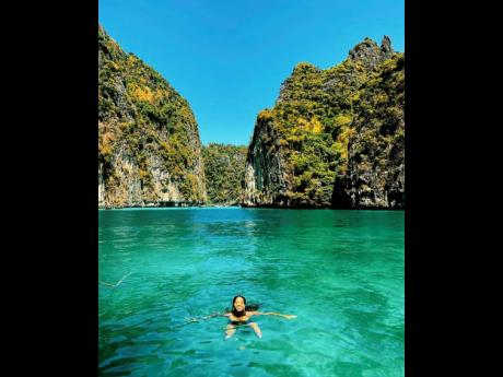 The Jamaican blogger shared that exploring the Phi Phi Islands and swimming in the Pileh Lagoon are must-dos when in Thailand. 